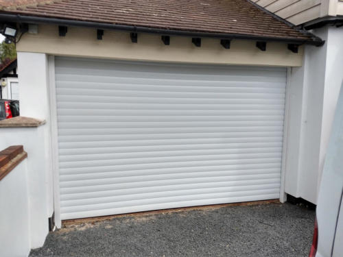 Electric 55mm roller garage door white